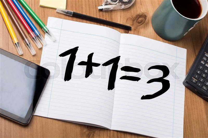 1 plus 1 equal 3 - plus one free - - Note Pad With Text On Wooden Table - with office tools, stock photo