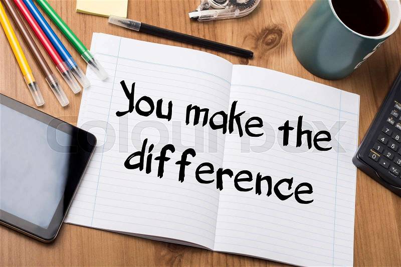You make the difference - Note Pad With Text On Wooden Table - with office tools, stock photo