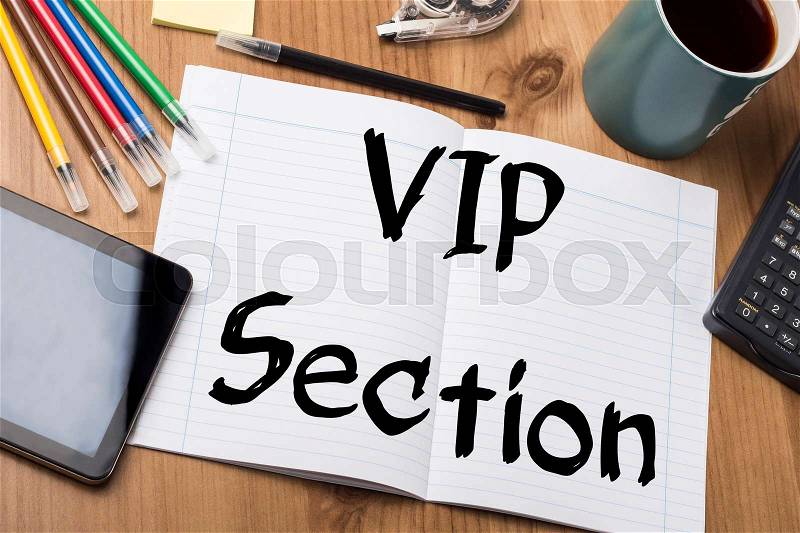 VIP Section - Note Pad With Text On Wooden Table - with office tools, stock photo