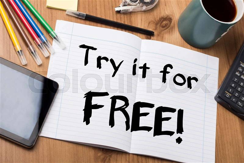 Try it for FREE! - Note Pad With Text On Wooden Table - with office tools, stock photo