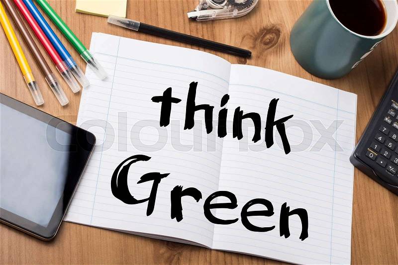 Think Green! - Note Pad With Text On Wooden Table - with office tools, stock photo