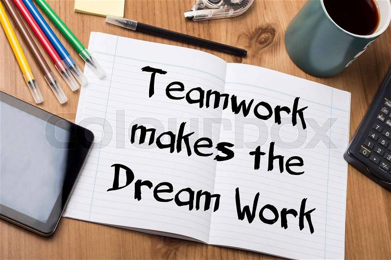 Teamwork makes the Dream Work - Note Pad With Text On Wooden Table - with office tools, stock photo