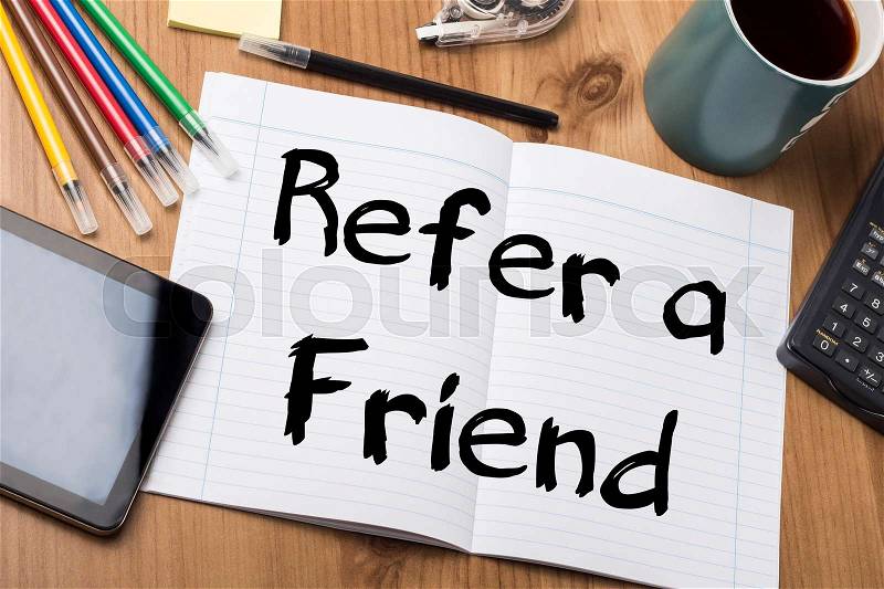 Refer a Friend - Note Pad With Text On Wooden Table - with office tools, stock photo