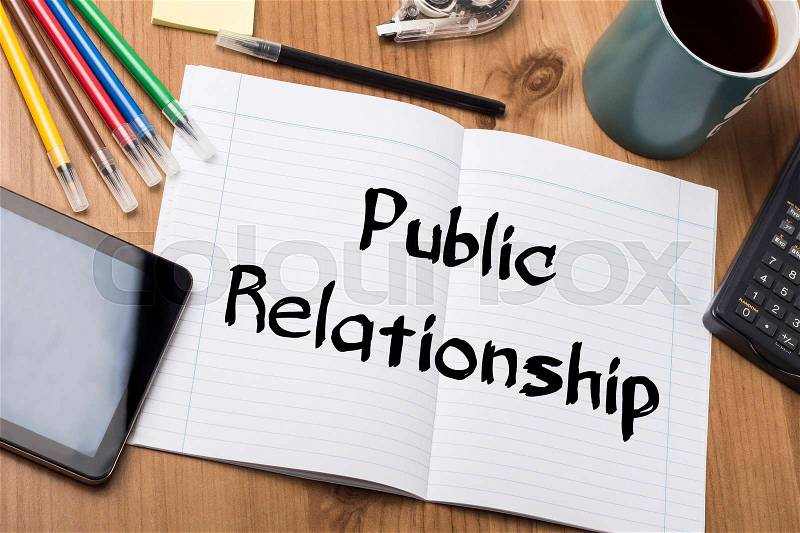 Public Relationship - Note Pad With Text On Wooden Table - with office tools, stock photo