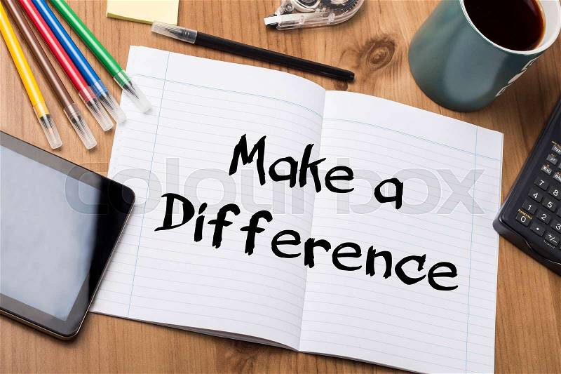 Make a Difference - Note Pad With Text On Wooden Table - with office tools, stock photo