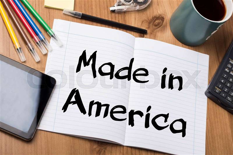Made in America - Note Pad With Text On Wooden Table - with office tools, stock photo