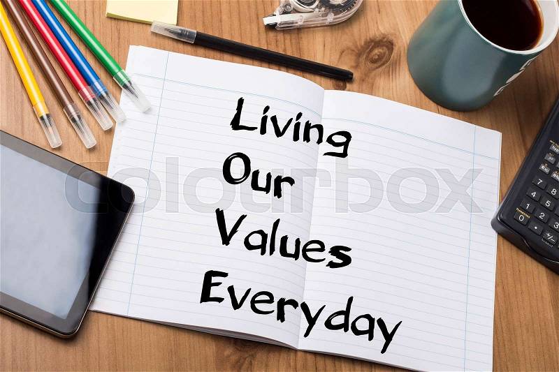 Living Our Values Everyday LOVE - Note Pad With Text On Wooden Table - with office tools, stock photo