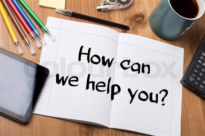 How can we help you? - Note Pad With Text On Wooden Table - with office tools, stock photo
