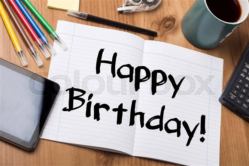 Happy Birthday! - Note Pad With Text On Wooden Table - with office tools, stock photo