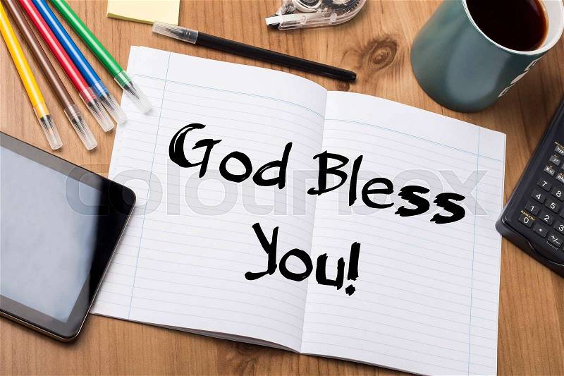 God Bless You! - Note Pad With Text On Wooden Table - with office tools, stock photo