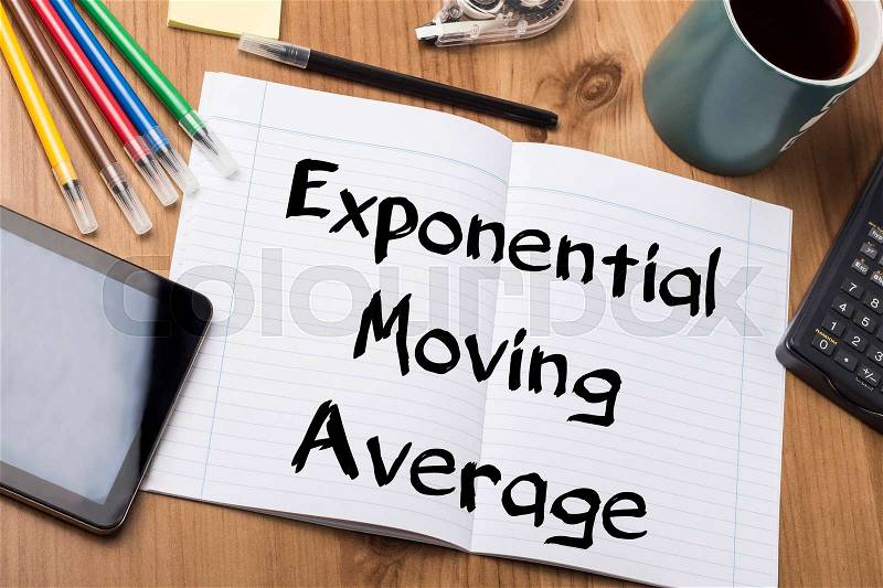 Exponential Moving Average EMA - Note Pad With Text On Wooden Table - with office tools, stock photo