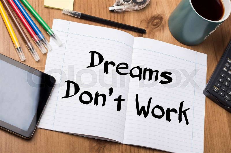 Dreams Don’t Work - Note Pad With Text On Wooden Table - with office tools, stock photo
