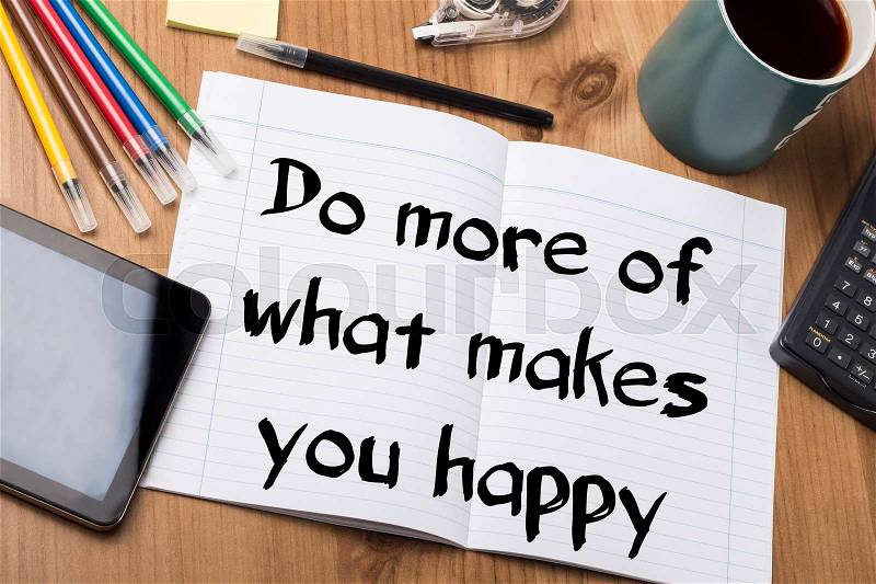 Do more of what makes you happy - Note Pad With Text On Wooden Table - with office tools, stock photo