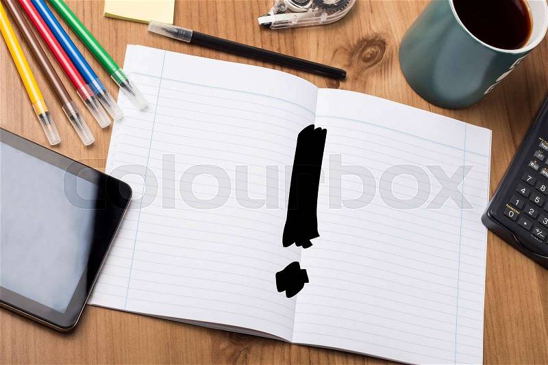 Attention sign - Note Pad With Text On Wooden Table - with office tools, stock photo
