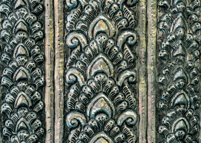 Close up image of Thai\'s old style pattern on silver plate, stock photo