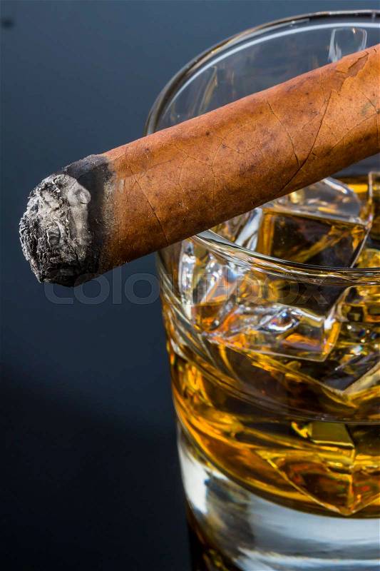 Cigar and whiskey. an icon photo for addiction and related, stock photo
