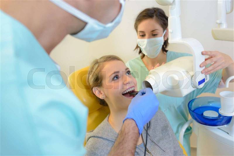 Lady in dentist\'s chair, stock photo