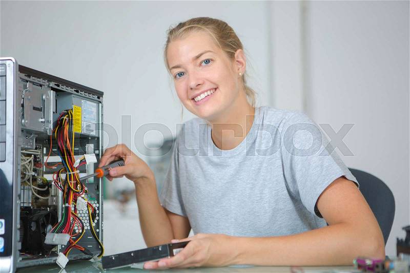 Computer technician posing, stock photo
