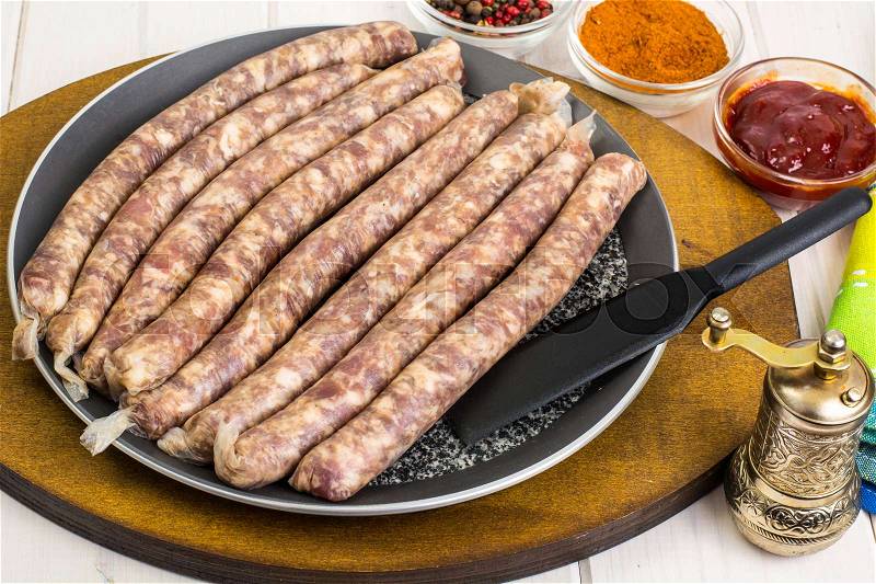 Sausage in natural cover for the grill. Studio Photo, stock photo