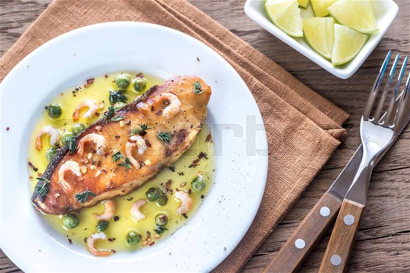 Fried fish with shrimp and peas, stock photo