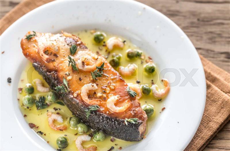 Fried fish with shrimp and peas, stock photo
