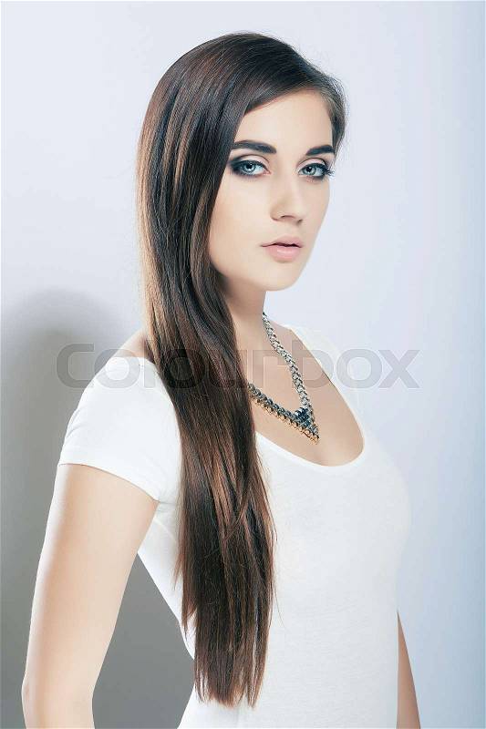 Portrait beautiful high key cute girl with long hair, blue eyes, stock photo