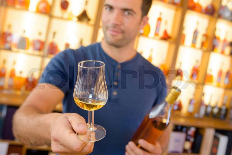 Serving a drink, stock photo
