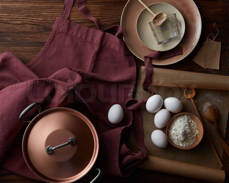 Milk, flour, eggs, etc. Kitchen devices pans, spoons, etc. for cooking cakes, Easter cakes, cookies, stock photo
