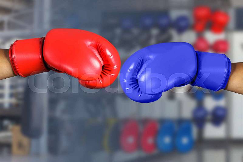 Red and Blue boxing gloves in Gym Fitness , stock photo