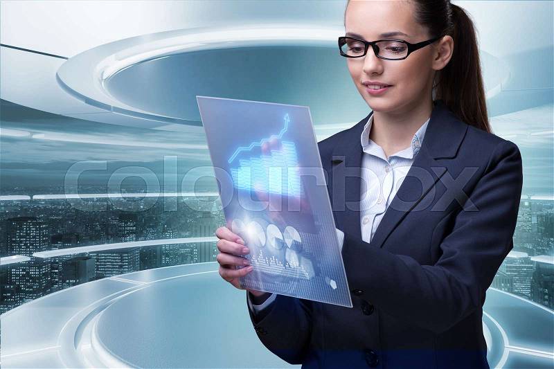 Businesswoman with tablet in data mining concept, stock photo