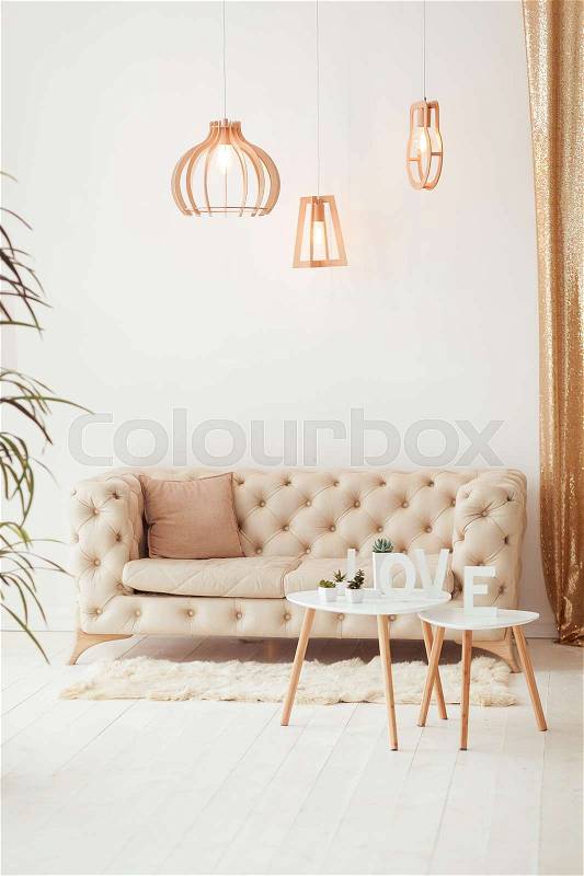 Interior living room with a sofa, table, floor lamp and panoramic window. Beautiful Living room Architecture Stock Images, Photos of Living room. Interior photography, stock photo