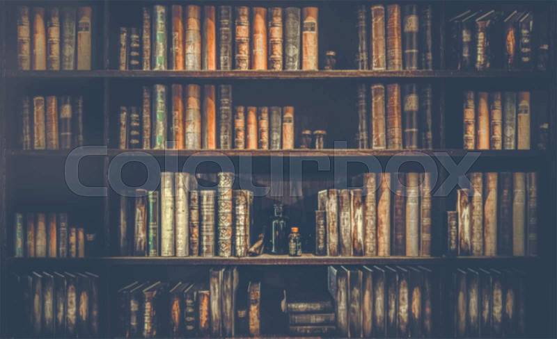 Blurred background . The background is a large bookshelf or book case on the wall, stock photo