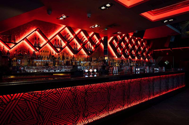 Interior shot of an alcoholic drinks bar in a nightclub, stock photo