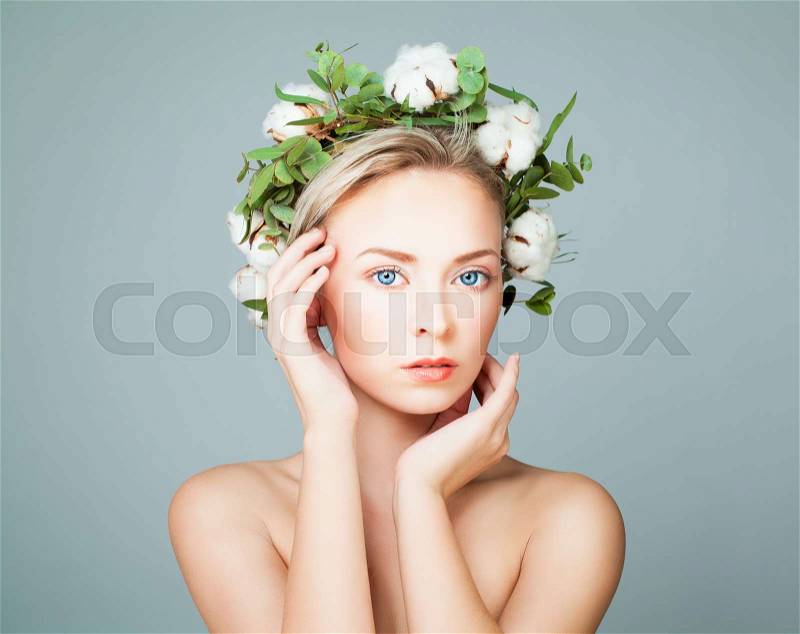 Perfect Lady in White Cotton Flowers Wreath. Spa Model on Blue Banner Background, stock photo