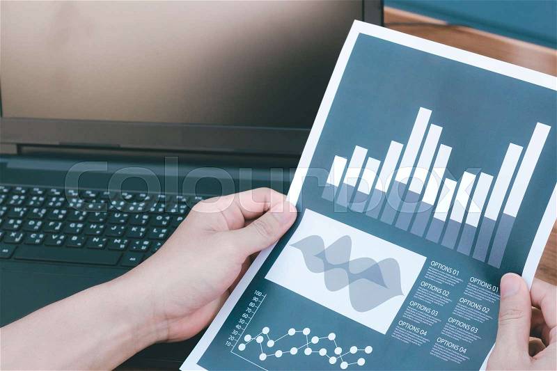 Business statistics success concept : businessman analytics financial accounting market chart and graph line ,selective focus. , stock photo