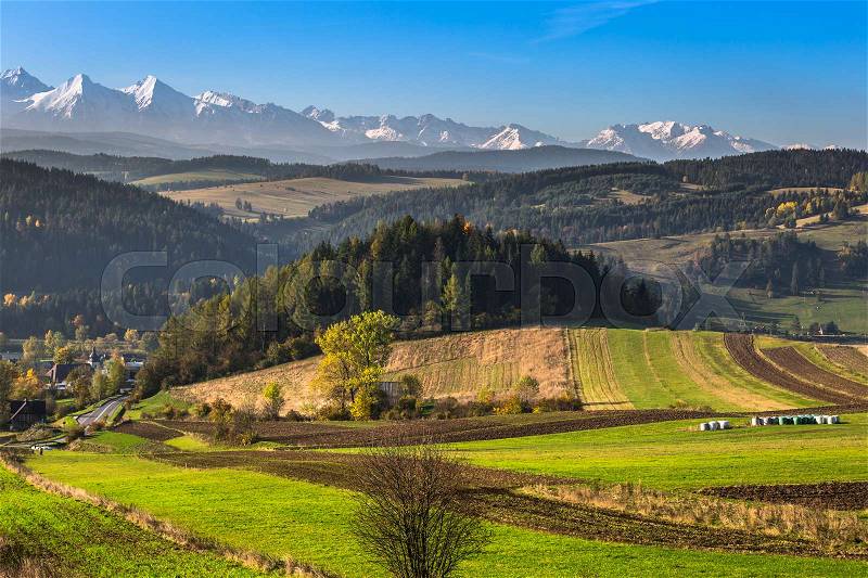 Tatra mountains in rural scene, Poland, stock photo