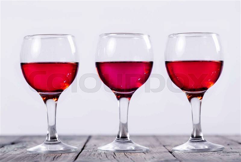 Collection of rose wine in a glass, stock photo