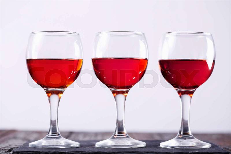Collection of rose wine in a glass, stock photo