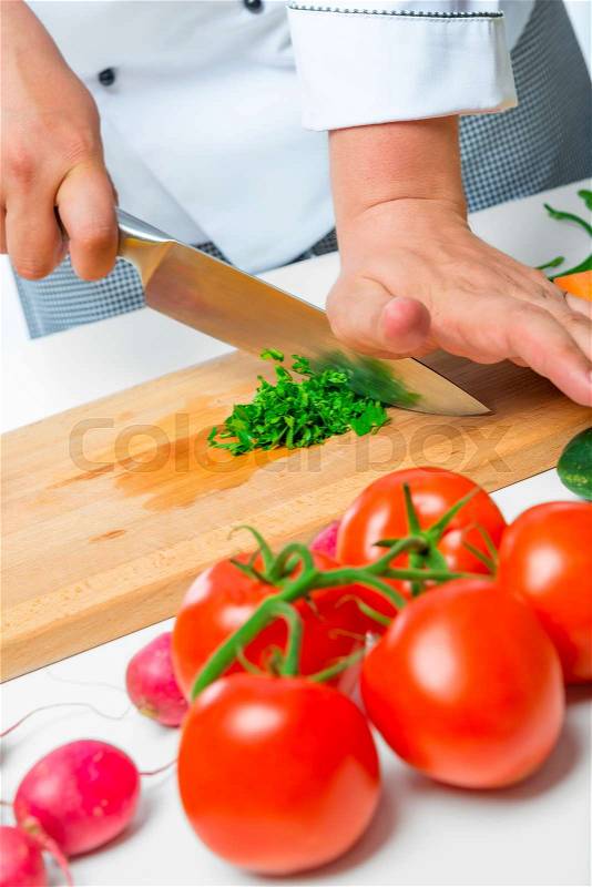 Hands chef prepared an amazing vegetable salad, stock photo