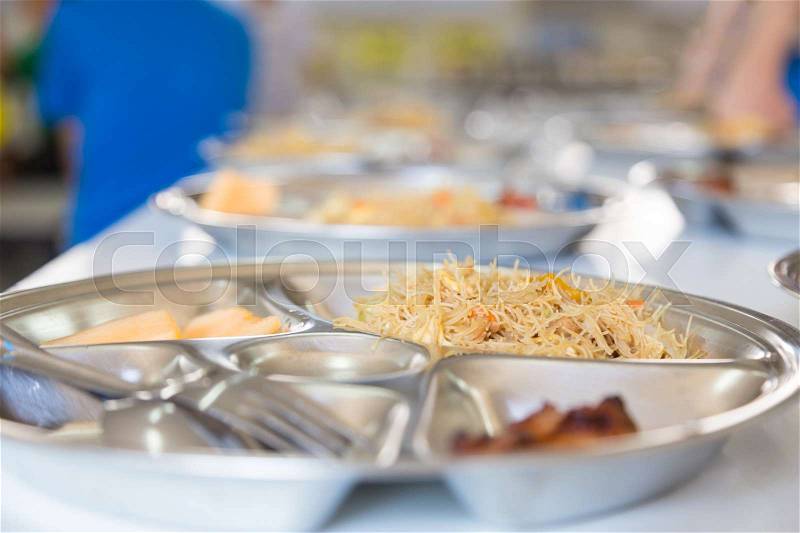 School lunch set, noodle and chicken set lunch for elementary students, selective focus on noodles, stock photo