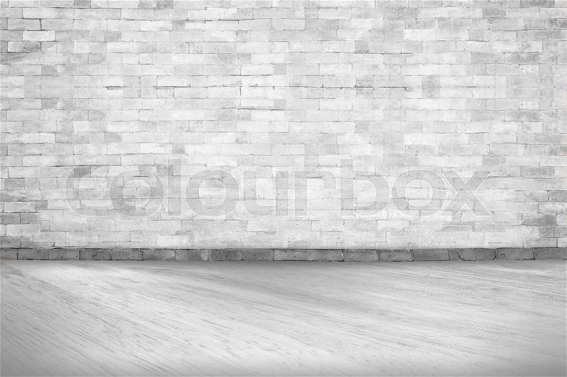 Abstract white interior of empty room with concrete wall and floor and picture frame of old vintage White brick wall, stock photo