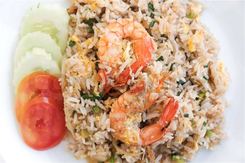 Thai food fire rice with shrimp and eggs on the plate, stock photo