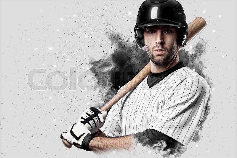 Baseball Player with a white uniform coming out of a blast of smoke , stock photo