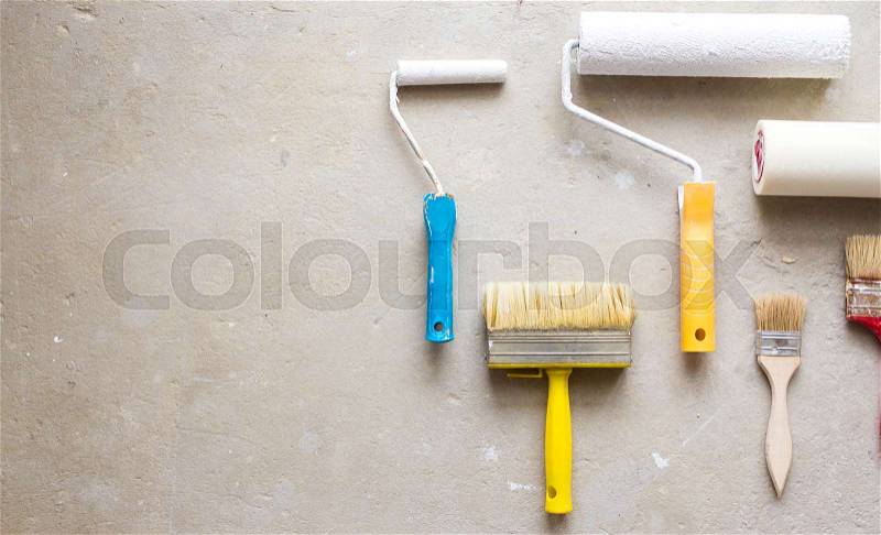 Organized copyspace painting tools color palette paint brush roller, stock photo