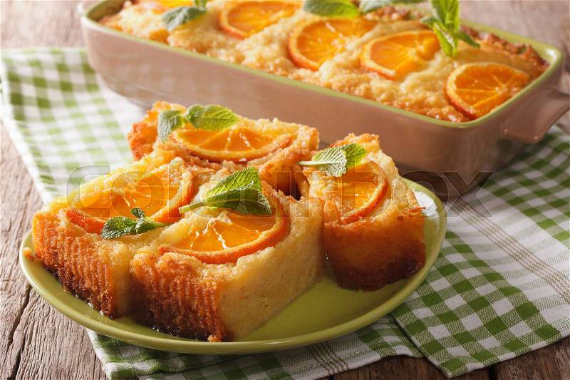 Sliced Greek Orange Pie With Phyllo - Portokalopita close-up on a table. Horizontal , stock photo