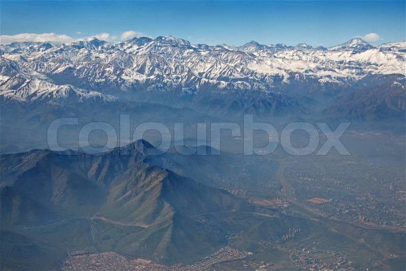 Aerial view of Andes and Santiago with smog, Chile, stock photo