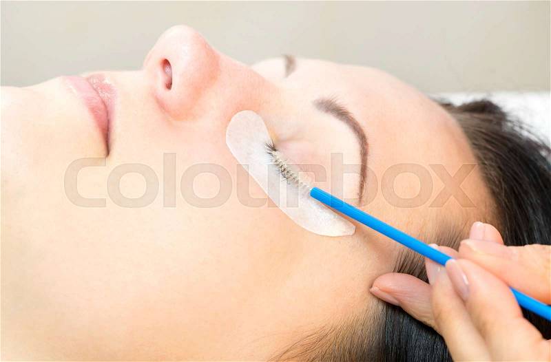 The process of eyelash extensions in the beauty salon, stock photo