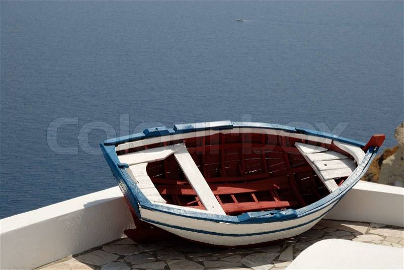 Old broken fishing boat in Santorini, Greece, stock photo