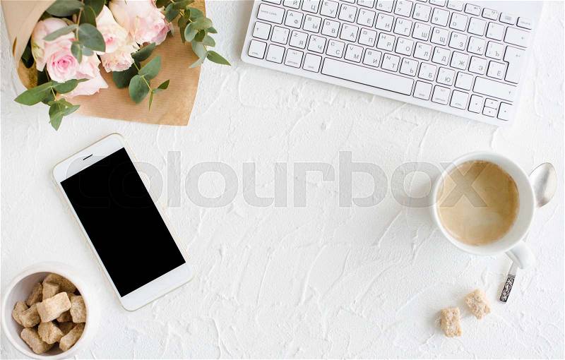 Romantic feminine background with coffee, smartphote mock-up and roses on white textured tabletop, elegant lady blogger workspace, stock photo