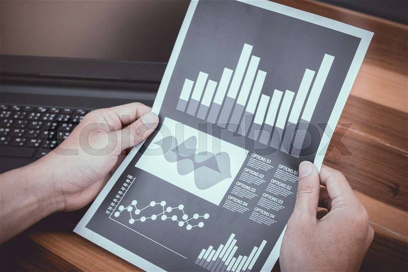 Business statistics success concept : businessman analytics financial accounting market chart and graph line ,selective focus. , stock photo